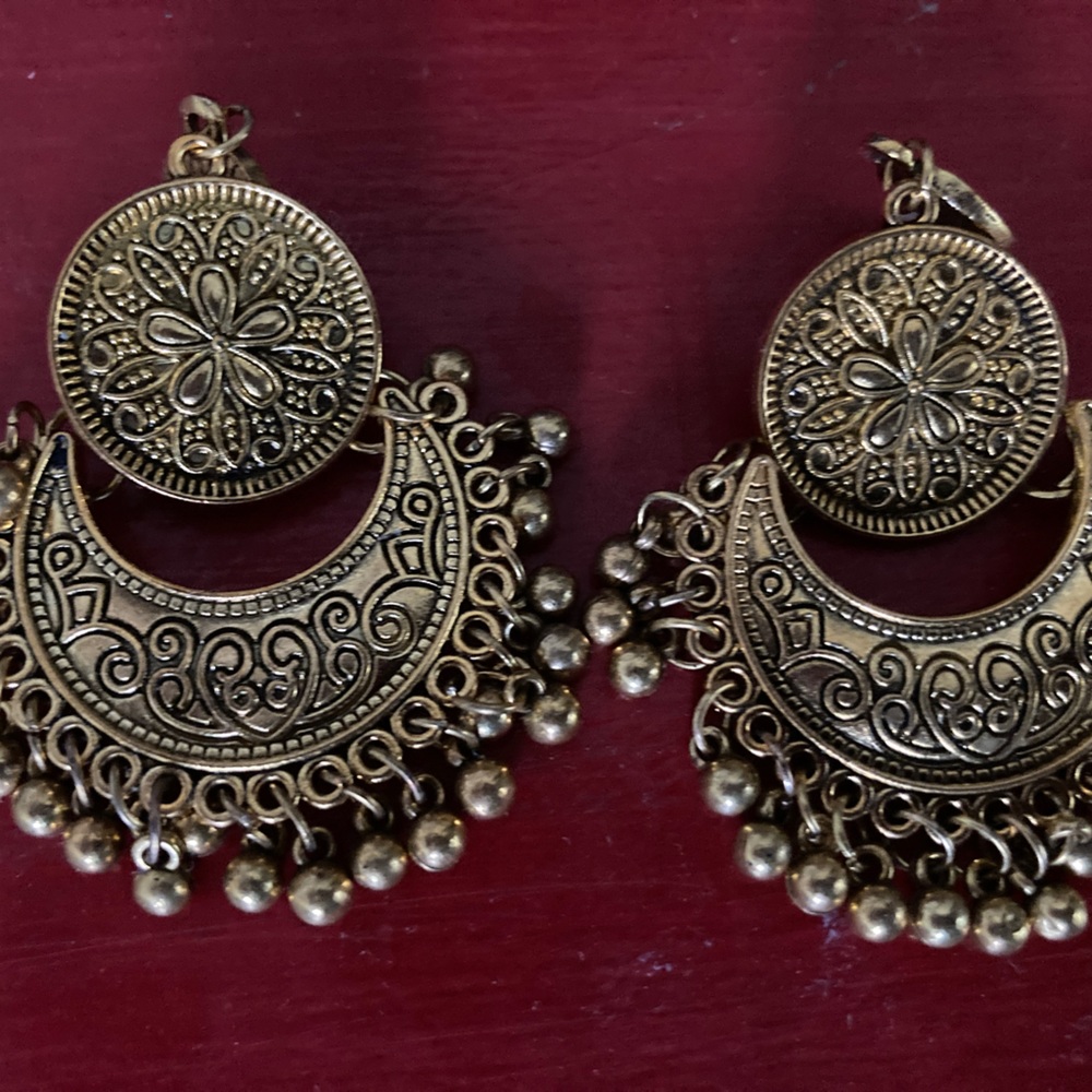 Gold tone intricate boho earrings